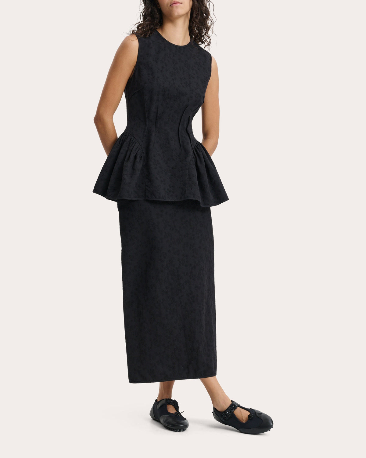 Daimi Eira Matelassé Boned Peplum Top