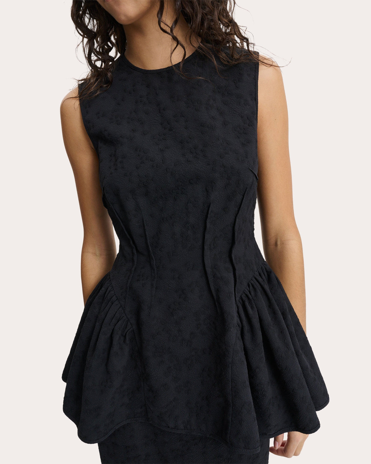Daimi Eira Matelassé Boned Peplum Top
