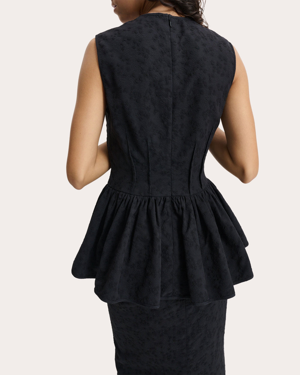 Daimi Eira Matelassé Boned Peplum Top