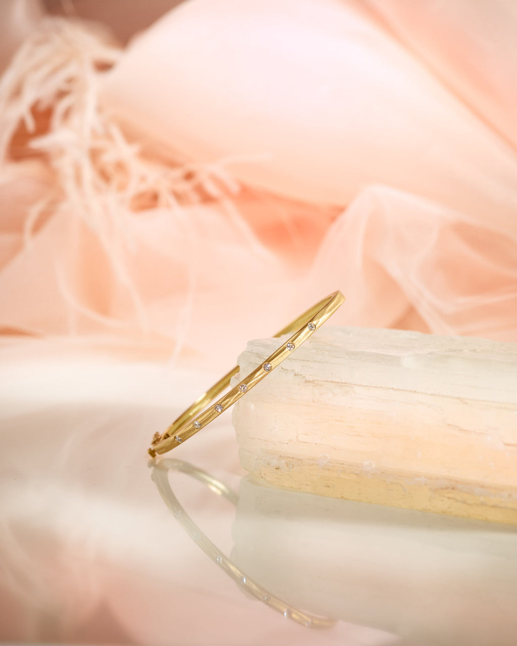 Diamond & 18k Gold Seven in a Row Bangle