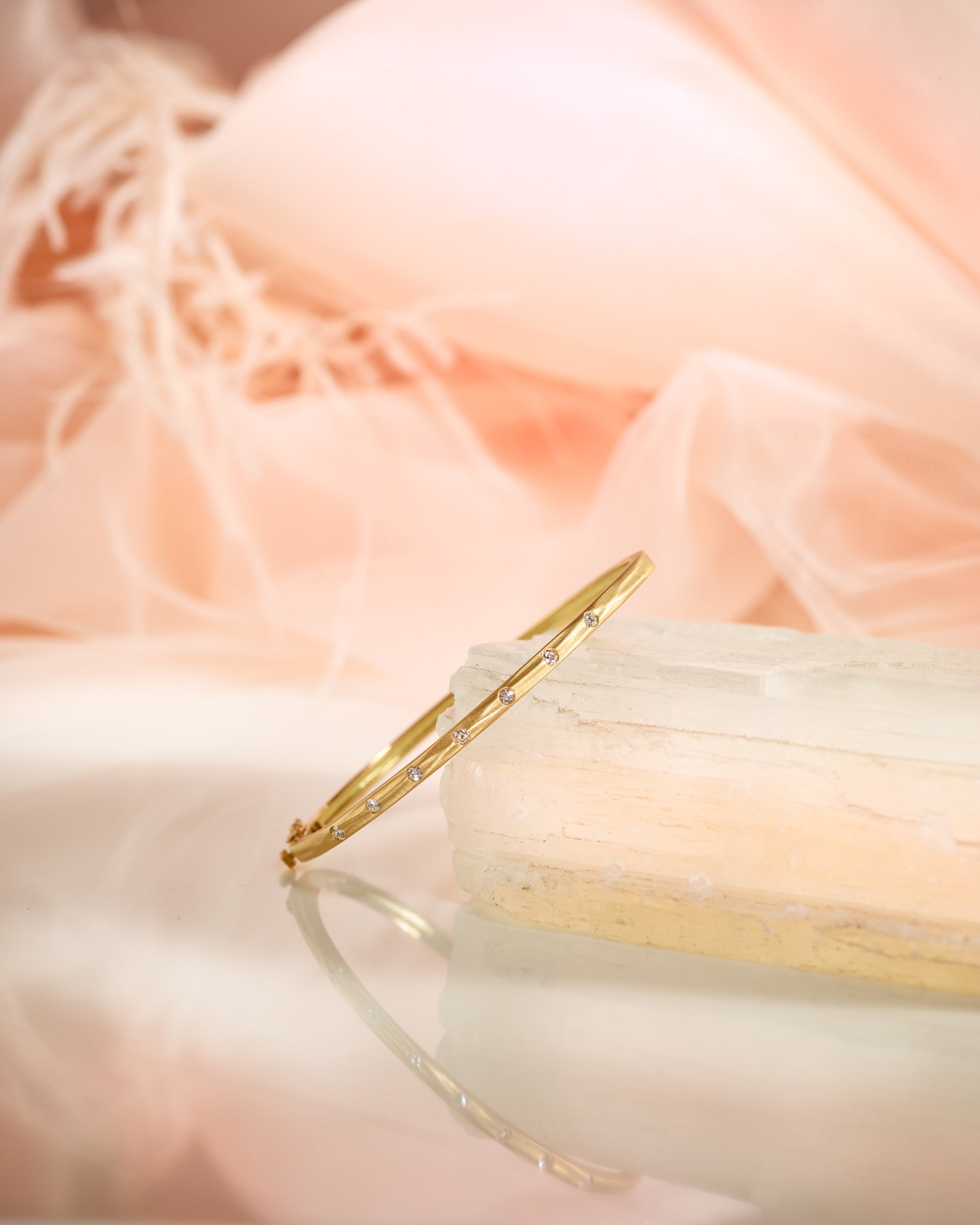 Diamond & 18k Gold Seven in a Row Bangle