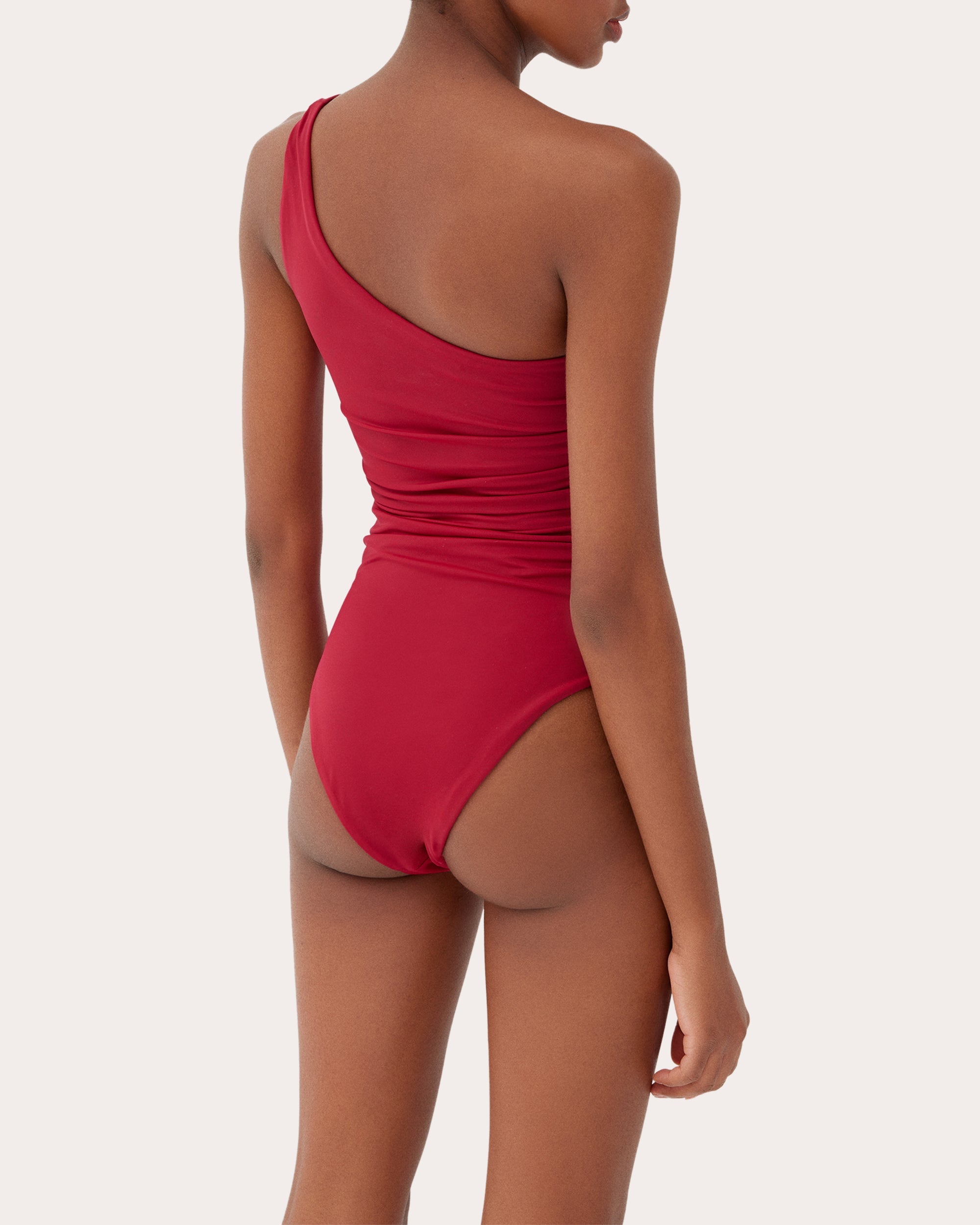 May Asymmetric One-Piece